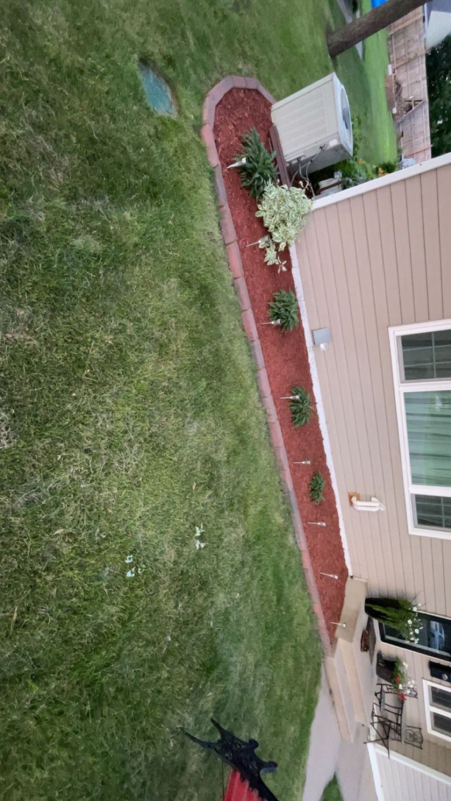 Beautiful landscaped backyard at sunset